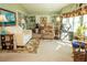 Comfortable living room with ample seating and built-in shelves at 1296 Skyline Dr, Tavares, FL 32778