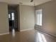 Bright bedroom with tile flooring and ceiling fan at 136 Pinewood Cir, Kissimmee, FL 34743