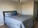 Cozy bedroom featuring a double bed and neutral decor at 136 Pinewood Cir, Kissimmee, FL 34743