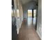 Bright entryway with tile floors leading to living room at 136 Pinewood Cir, Kissimmee, FL 34743