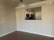 Kitchen features a pass-through to dining area at 136 Pinewood Cir, Kissimmee, FL 34743