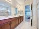 Double vanity bathroom with a large walk-in shower at 1812 Sandy Park Trl, Kissimmee, FL 34747
