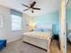 Main bedroom with king-size bed and neutral decor at 1812 Sandy Park Trl, Kissimmee, FL 34747