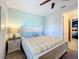 Guest bedroom with king-size bed and soft color scheme at 1812 Sandy Park Trl, Kissimmee, FL 34747