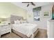 Guest bedroom with a full-size bed and neutral decor at 1812 Sandy Park Trl, Kissimmee, FL 34747