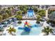 Aerial view of resort-style pool with water features and a playground at 1812 Sandy Park Trl, Kissimmee, FL 34747