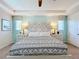 Spacious main bedroom with a large bed and neutral color palette at 1812 Sandy Park Trl, Kissimmee, FL 34747