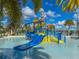 Community waterpark with slides and a splash pad at 1812 Sandy Park Trl, Kissimmee, FL 34747