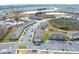 Aerial view of townhouses and surrounding landscape at 215 Annabelle Way, Davenport, FL 33837