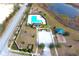 Community pool, playground, and surrounding landscape at 215 Annabelle Way, Davenport, FL 33837