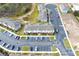Aerial view of townhouses with parking and landscaping at 215 Annabelle Way, Davenport, FL 33837