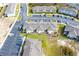 Aerial view of townhomes with parking and landscaping at 215 Annabelle Way, Davenport, FL 33837