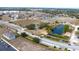Aerial view showing community, school, and landscaping at 215 Annabelle Way, Davenport, FL 33837