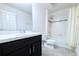 Bathroom with shower, tub, and vanity at 215 Annabelle Way, Davenport, FL 33837
