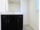 Bathroom with vanity and mirror at 215 Annabelle Way, Davenport, FL 33837