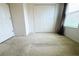 Simple bedroom with carpet and double door closet at 215 Annabelle Way, Davenport, FL 33837