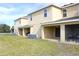 Exterior view of townhouses with covered patios at 215 Annabelle Way, Davenport, FL 33837