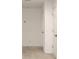 Upstairs hallway with carpet and access to bedrooms at 215 Annabelle Way, Davenport, FL 33837