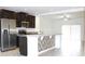 Modern kitchen with stainless steel appliances and island at 215 Annabelle Way, Davenport, FL 33837