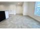 Bright living room with tile floors and access to the kitchen at 215 Annabelle Way, Davenport, FL 33837