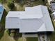 Top-down view showcasing home's roofline and landscaping at 219 Macon Way, St Cloud, FL 34769