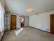 Bedroom with floral wallpaper and carpeted floors at 219 Macon Way, St Cloud, FL 34769