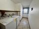 Laundry room with washer and dryer hookups at 219 Macon Way, St Cloud, FL 34769