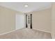 Spacious bedroom with neutral walls and carpeting at 223 Largovista Dr, Oakland, FL 34787