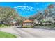 Community gated entrance with guardhouse at 223 Largovista Dr, Oakland, FL 34787
