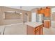 Eat-in kitchen with island and view into Gathering room at 223 Largovista Dr, Oakland, FL 34787