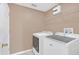 Laundry room with washer, dryer, and shelving at 223 Largovista Dr, Oakland, FL 34787