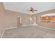 Living area with open kitchen access and neutral tones at 223 Largovista Dr, Oakland, FL 34787
