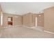 Large living room with neutral walls and carpeted floors at 223 Largovista Dr, Oakland, FL 34787