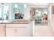 Open kitchen with modern countertops and stainless steel appliances at 2285 Palm Tree Dr, Kissimmee, FL 34759
