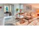 Bright living room with plush seating and patio access at 2285 Palm Tree Dr, Kissimmee, FL 34759