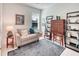 Office space with sofa, small shelves of books, and a small window bringing in natural light at 2285 Palm Tree Dr, Kissimmee, FL 34759