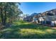 Landscaped backyard with multiple townhouses at 2381 Reading Trl, Kissimmee, FL 34746