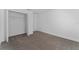 Bright bedroom with carpeted floors and spacious closet at 2381 Reading Trl, Kissimmee, FL 34746