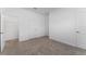 Bright bedroom with carpeted floors and neutral walls at 2381 Reading Trl, Kissimmee, FL 34746