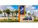 Story Lake community entrance sign with palm trees and landscaping at 2381 Reading Trl, Kissimmee, FL 34746
