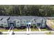 Two-story townhouses with gray siding and gray roofs at 2381 Reading Trl, Kissimmee, FL 34746