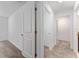 Bright hallway with doors leading to bedrooms and other rooms at 2381 Reading Trl, Kissimmee, FL 34746