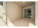 Private patio with sliding glass door access at 2381 Reading Trl, Kissimmee, FL 34746