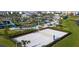 Sand volleyball court, pool, and water park in the background at 2381 Reading Trl, Kissimmee, FL 34746