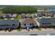 Neighborhood aerial view showcasing homes with well-maintained yards in a community setting at 2449 Varenna Loop, Kissimmee, FL 34741