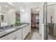 Elegant bathroom with granite countertops and a large shower at 2451 Datura Loop, St Cloud, FL 34772