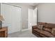 Serene bedroom with double doors leading to another room at 2451 Datura Loop, St Cloud, FL 34772