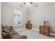 Spacious bedroom with wood furniture and plenty of natural light at 2451 Datura Loop, St Cloud, FL 34772