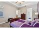 Spacious bedroom with a dresser and ensuite bathroom access at 2451 Datura Loop, St Cloud, FL 34772