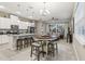 Modern kitchen with granite countertops, white cabinets, and island at 2451 Datura Loop, St Cloud, FL 34772